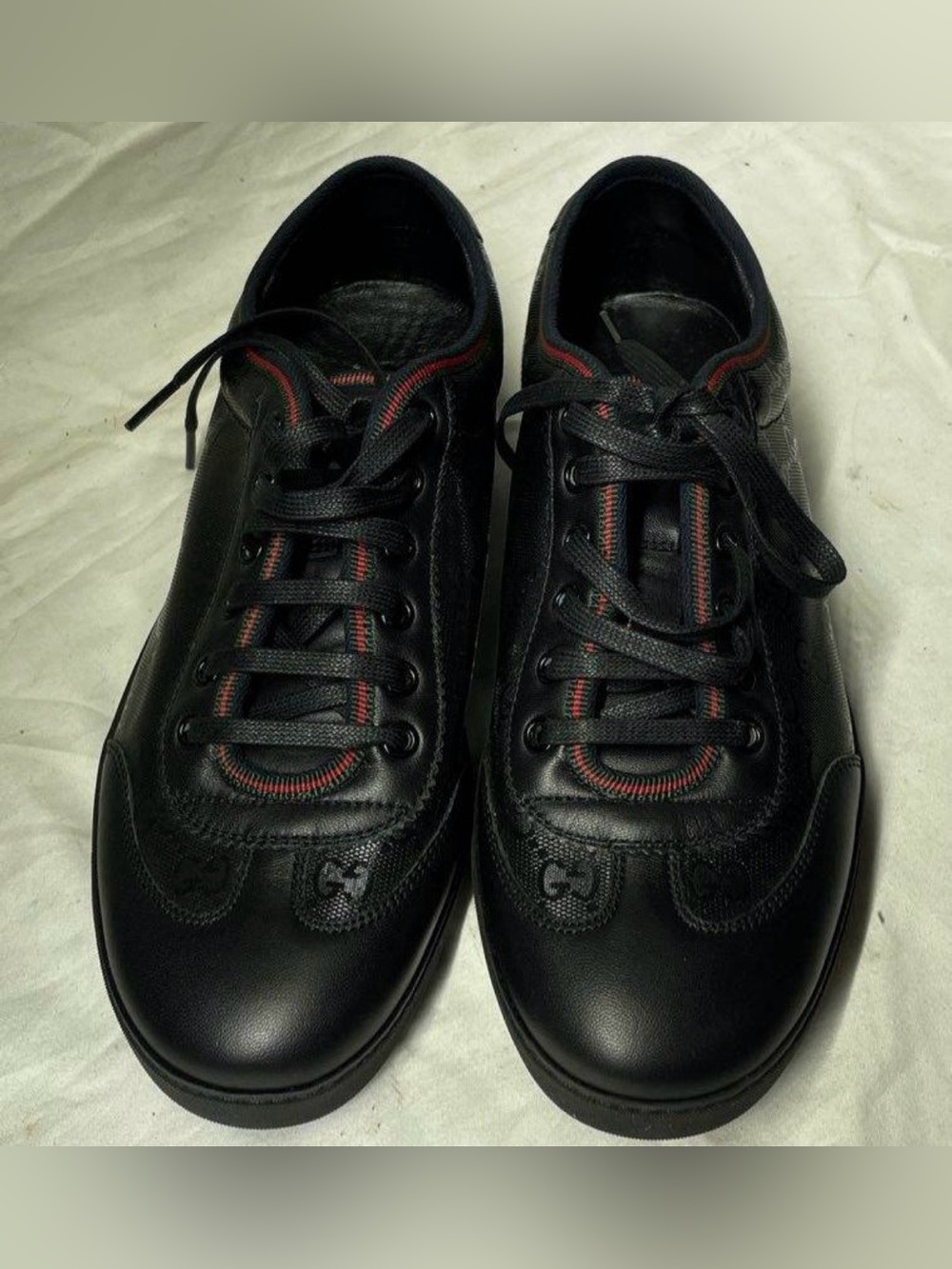 Gucci Black Leather Sneakers with Red Stripe Accents